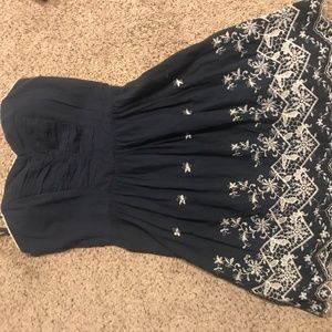 Navy blue pleated dress with lace